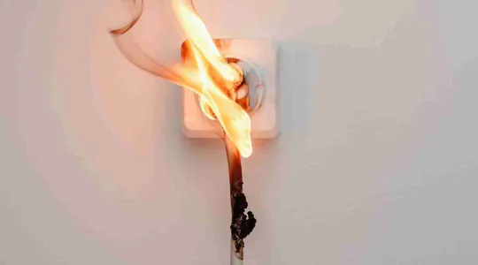 electrical outlet in fire