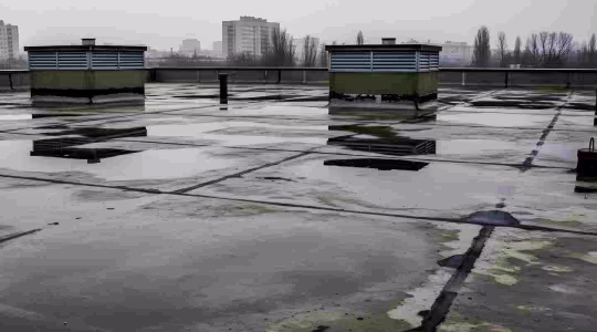 water damage on commercial flat roof