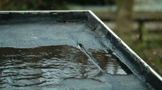 Retail center roof leaks after winter thaws