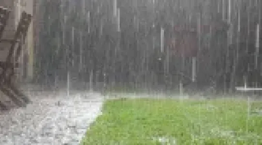 Heavy rain and stormwater runoff outside a Nicholasville KY home after severe weather