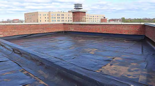 water damage on flat commercial roof